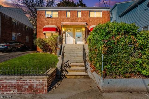 Photo of 410 E 26th St, Paterson, NJ 07514 (MLS # 3993421)