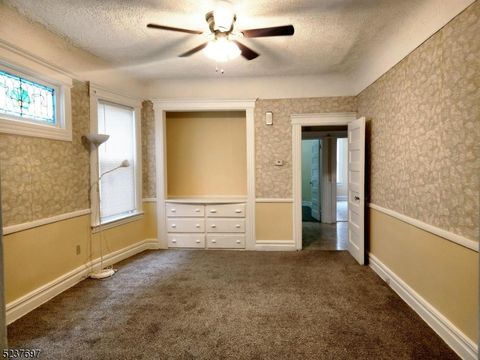 Photo of 28 Rhode Island Ave, East Orange, NJ 07018 (MLS # 3991146)