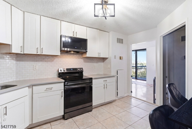 831 Harmon Cove Tower