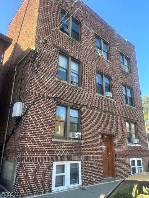 Photo of 298 Montgomery St, Passaic, NJ 07055 (MLS # 3972502)