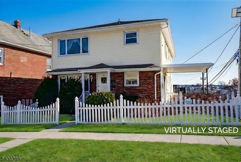 Photo of 104 Belmont Ave, Garfield, NJ 07026 (MLS # 4008101)