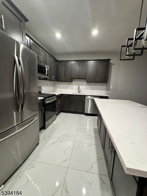 Photo of 61 N Grove St, East Orange, NJ 07017 (MLS # 3995265)