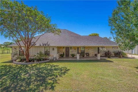 Photo of 8748 Tejas Ranch Loop, Bryan, TX 77808 (MLS # 26010341)