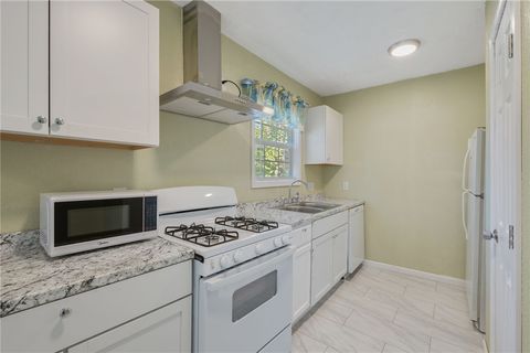 Tiny photo for 401 E Third Street, Hearne, TX 77859 (MLS # 25011010)
