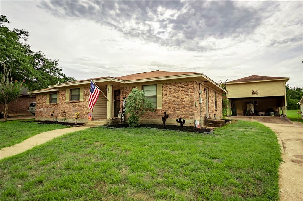 Photo of 89 Fairway Drive, Hilltop Lakes, TX 77871 (MLS # 26008912)