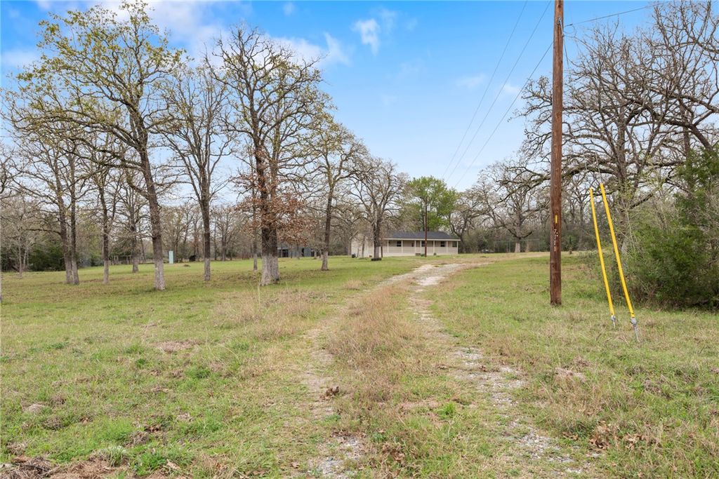 Photo of 7111 Refugio Circle, Bedias, TX 77831 (MLS # 26002362)