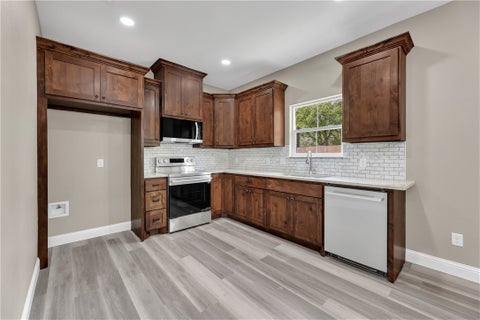 Photo of 905 W Virginia Street, Navasota, TX 77868 (MLS # 26011983)