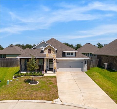 Photo of 10603 Scarlet Peak Court, Bryan, TX 77845 (MLS # 26000001)