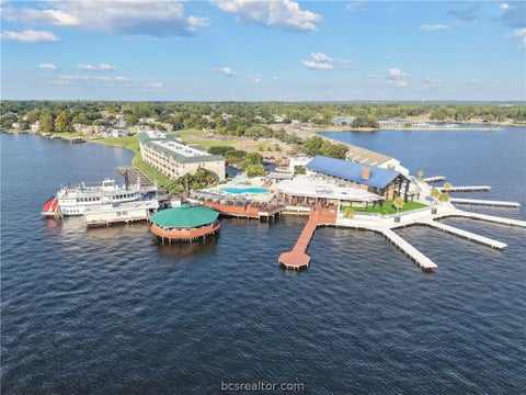 Tiny photo for 7037 Kingston Cove #114, Willis, TX 77318 (MLS # 26012236)