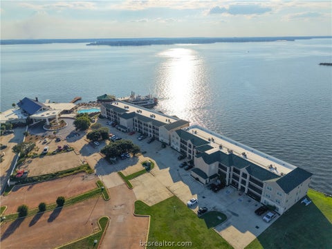 Tiny photo for 7037 Kingston Cove #114, Willis, TX 77318 (MLS # 26012236)