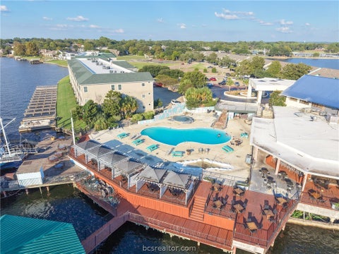 Tiny photo for 7037 Kingston Cove #114, Willis, TX 77318 (MLS # 26012236)