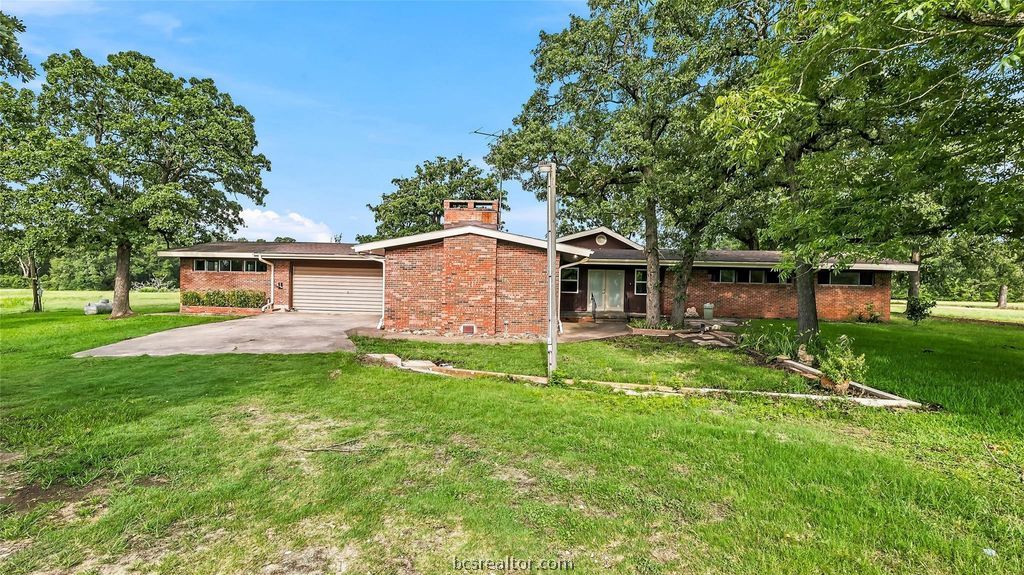 Photo of 16121 Fm 2620 Road, Bedias, TX 77831 (MLS # 26010723)