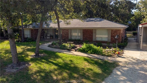 Photo of 35 Golfclub Drive, Hilltop Lakes, TX 77871 (MLS # 26011029)