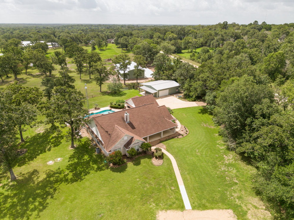 Photo of 7710 Elmo Weedon Road, Bryan, TX 77808 (MLS # 26007405)