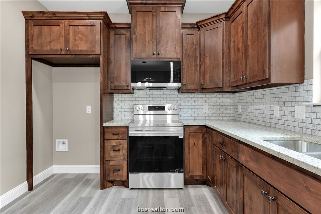 Photo of 905 W Virginia Street, Navasota, TX 77868 (MLS # 26004430)