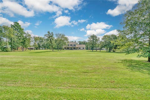 Photo of 26 Woodland Hills Dr Drive, Huntsville, TX 77320 (MLS # 26010661)