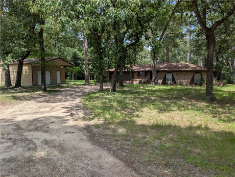 Photo of 16745 Dogwood Court, Plantersville, TX 77363 (MLS # 26009740)