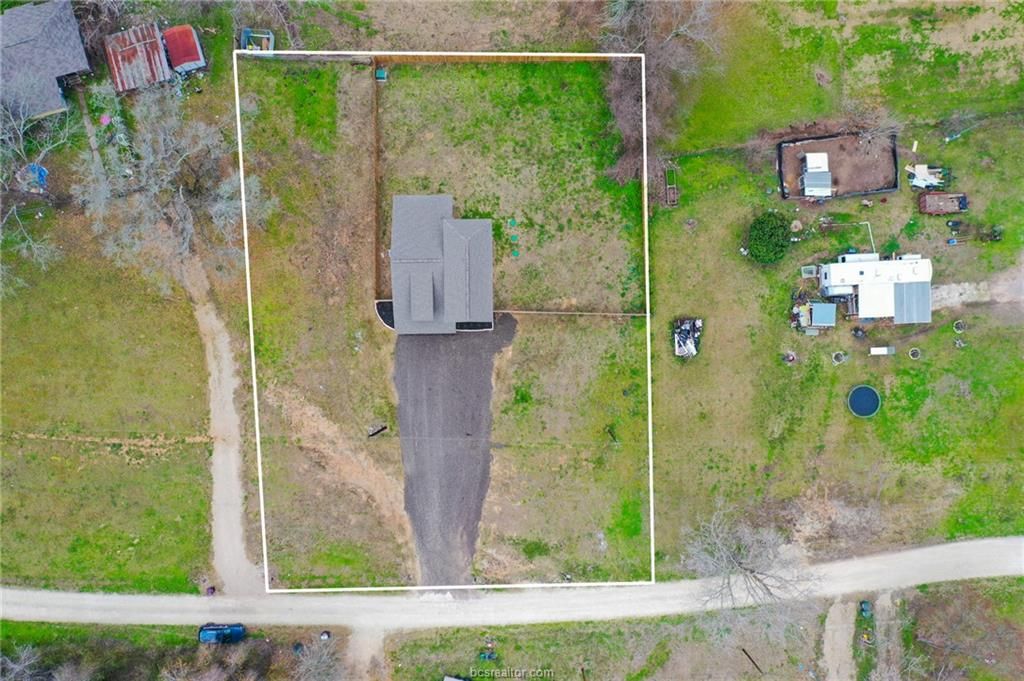 Photo of 22562 Buchanan Street, Navasota, TX 77868 (MLS # 26002191)