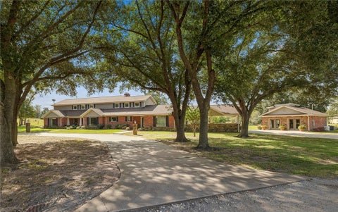 Photo of 1427 Old Mill Lane, Madisonville, TX 77864 (MLS # 26012855)