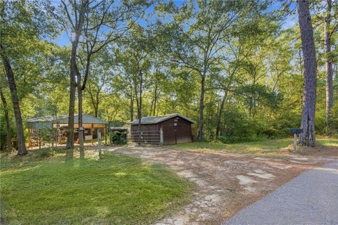 Photo of 13163 County Road 201, Plantersville, TX 77363 (MLS # 26012013)