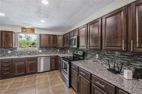 Tiny photo for 2009 Quail Run RUN, College Station, TX 77845 (MLS # 26011147)