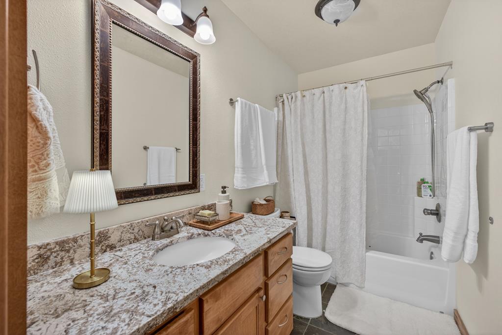 The guest bath upstaris , Remodeld with granite counters, new lighting and new floors,