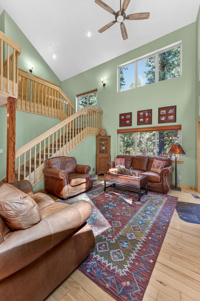 The Staricase to the loft, The vaulted ceiling in the great room brings great natural light.