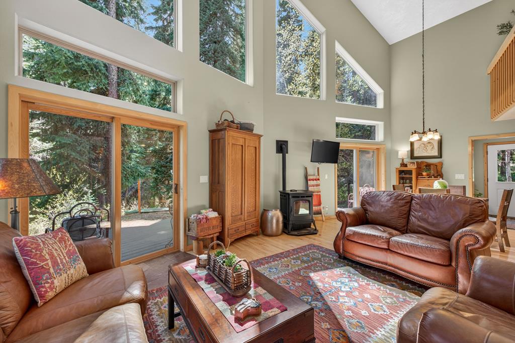 The Great Room,  with access to the back deck and a pellet stove for cool days.