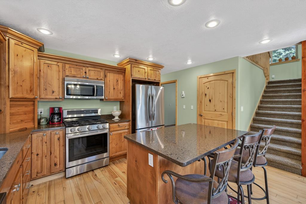 The kitchen, with a granite island.