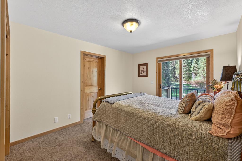 The second guest room has the access to the unfinished bonus room.