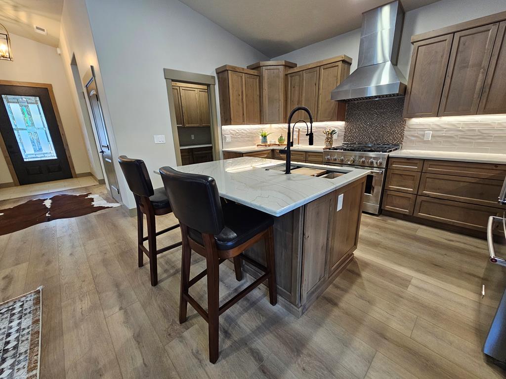 Front door and entry into kitchen.