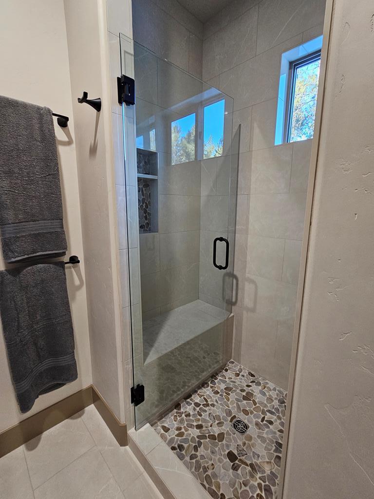 Pebbled floors in walk in shower