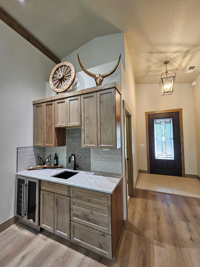 Bar and main entry., Alder cabinets.