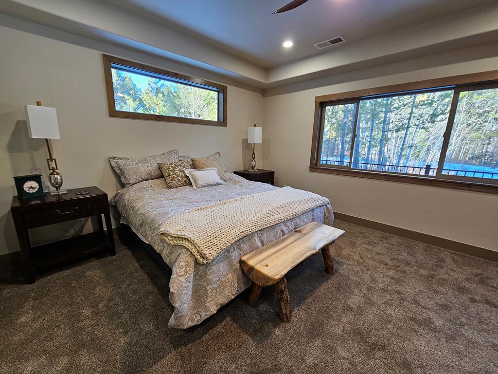 Large windows to wooded views.