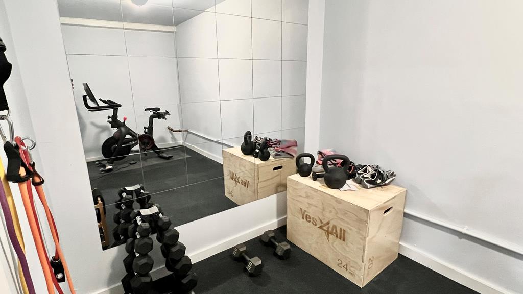 Exercise Room with Peloton & Weights