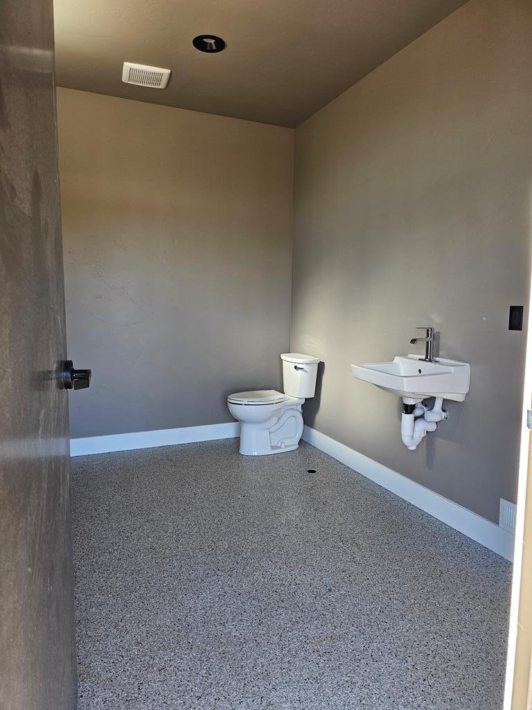 One of two owner's restrooms