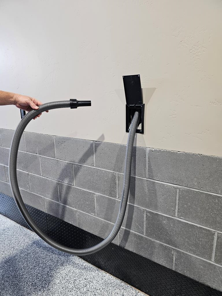 Central vac with long hose.