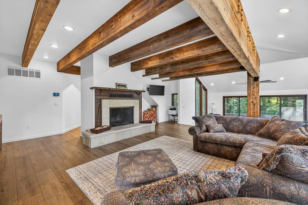 Beautiful beam work throughout, Wood burning fireplace for those chilly winter nights.