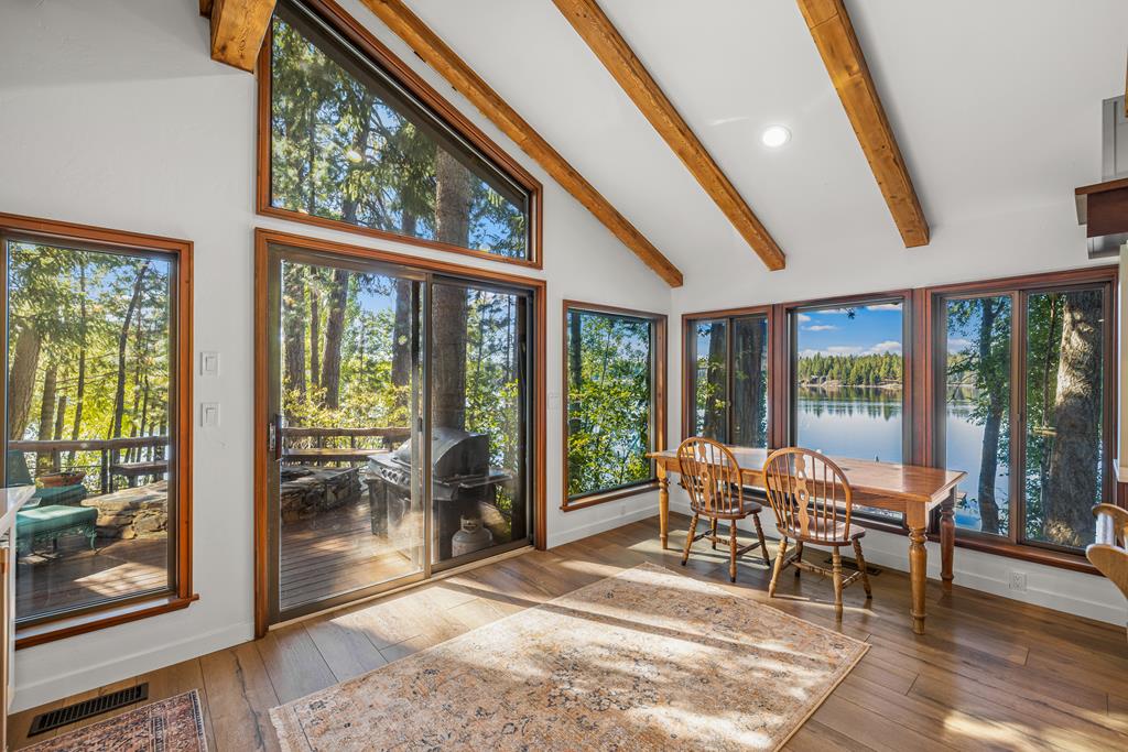 Slider access to the deck., Seamless integration from the indoors to the outside through this large slider door. Imagine grabbing your morning brew and sitting outside enjoying the sound of the waves lapping on the shore.