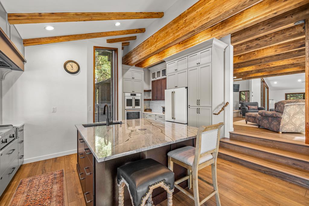 Kitchen flows into the living area.