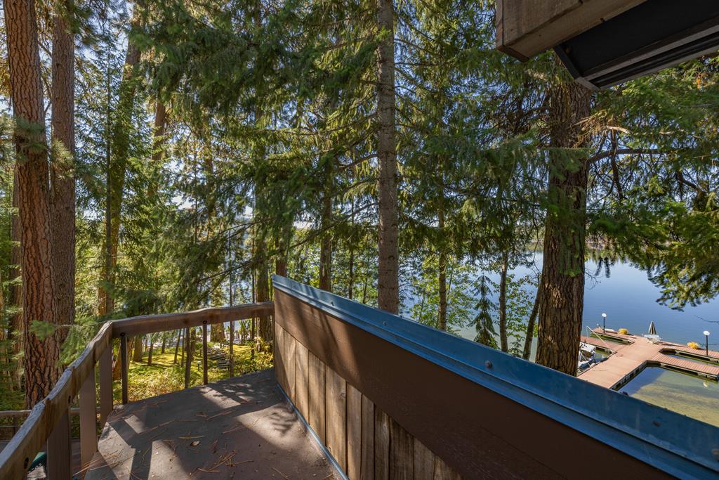 Deck off of the primary bedroom., Magnificent views from the primary  bedroom deck. A tranquil spot to soak in the lake vibes.