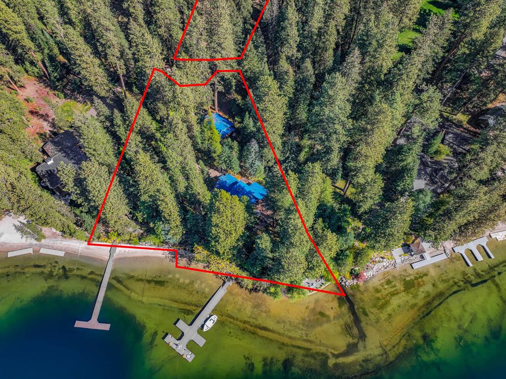 Three lots comprise the parcel., Two front on the lake and the third follows the creek bed on the southern property line. Lot lines are an approximation only.