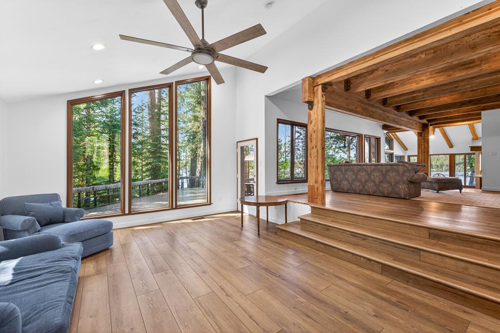 Expanded living area., Even more windows with lake views. Great area for game night or to tuck into your favorite book.