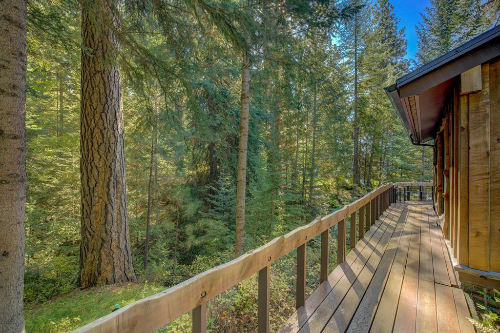 Deck wraps around the main house.