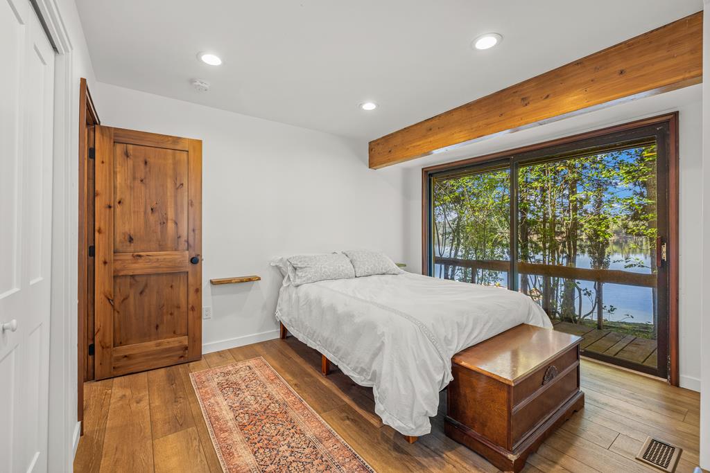 Downstairs bedroom #1., Has slider access to a small deck area right above the lake.
