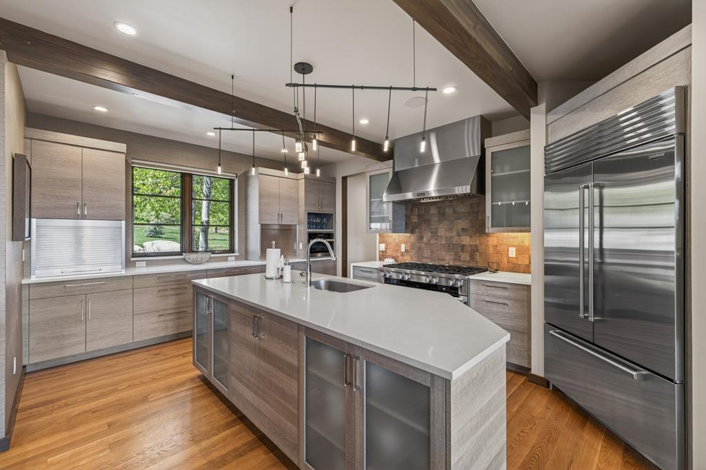 Gourmet Kitchen , The very well appointed Kitchen includes a Miele 8 burner Range; a SubZero Refrigerator; a Miele Microwave; a Uline Wine Cooler and a Bosch Dishwasher.