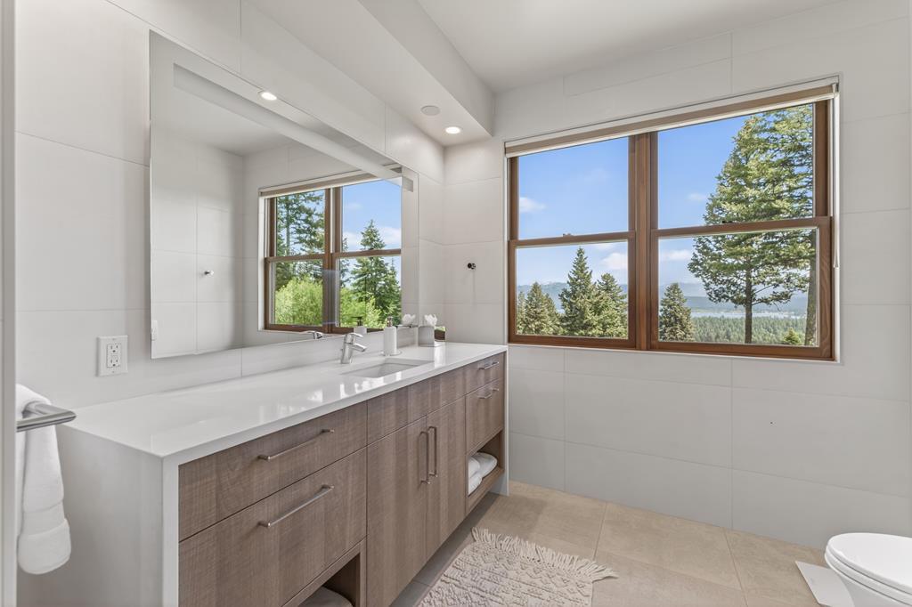 "His" Main Level Master Suite Vanity & Toilet area