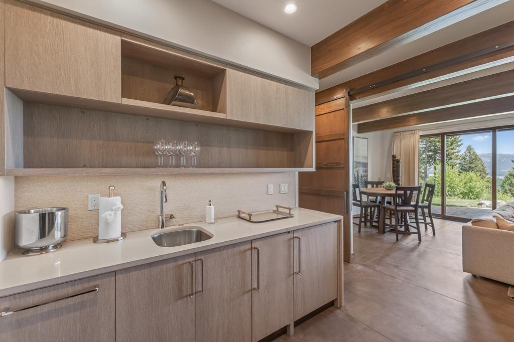 Downstairs Bar Area , The Bar Area includes a refrigerator; ice maker; dishwasher and disposal.