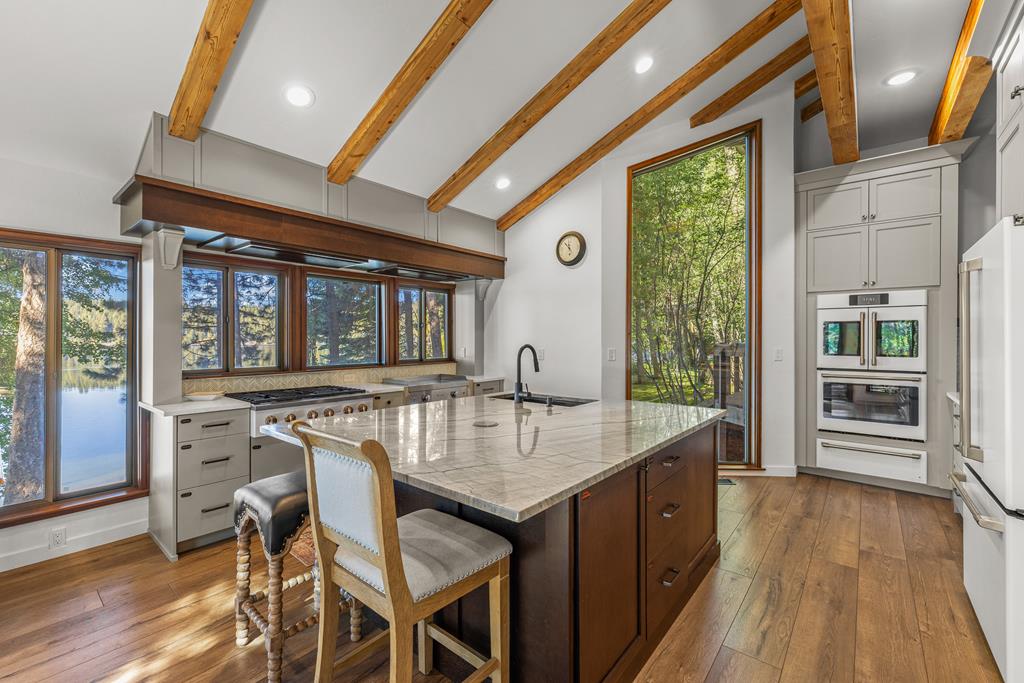Vaulted ceilings with wood beams.