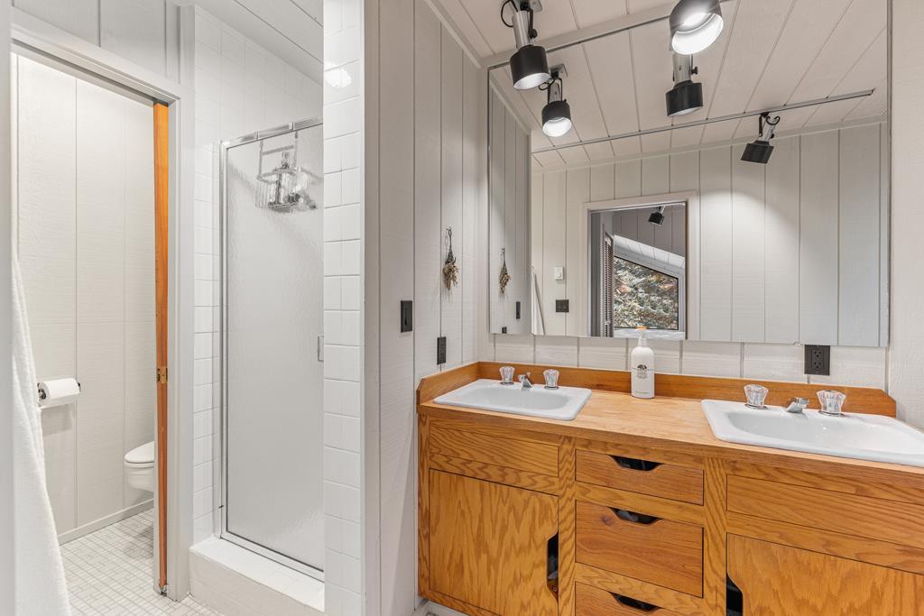 Dual vanities, shower in bunkhouse.